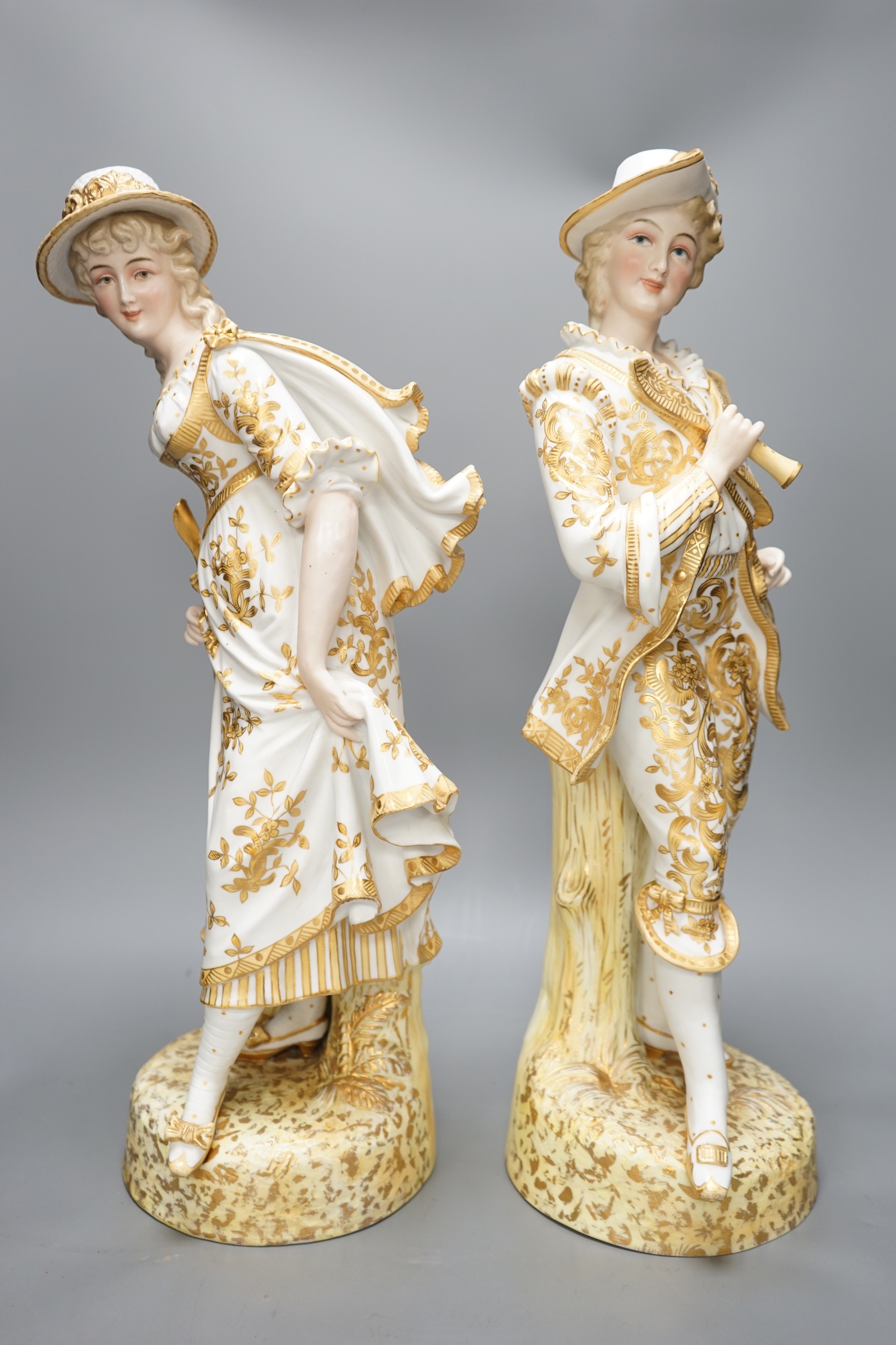 A pair of late 19th century Paris porcelain figures, tallest 50cm